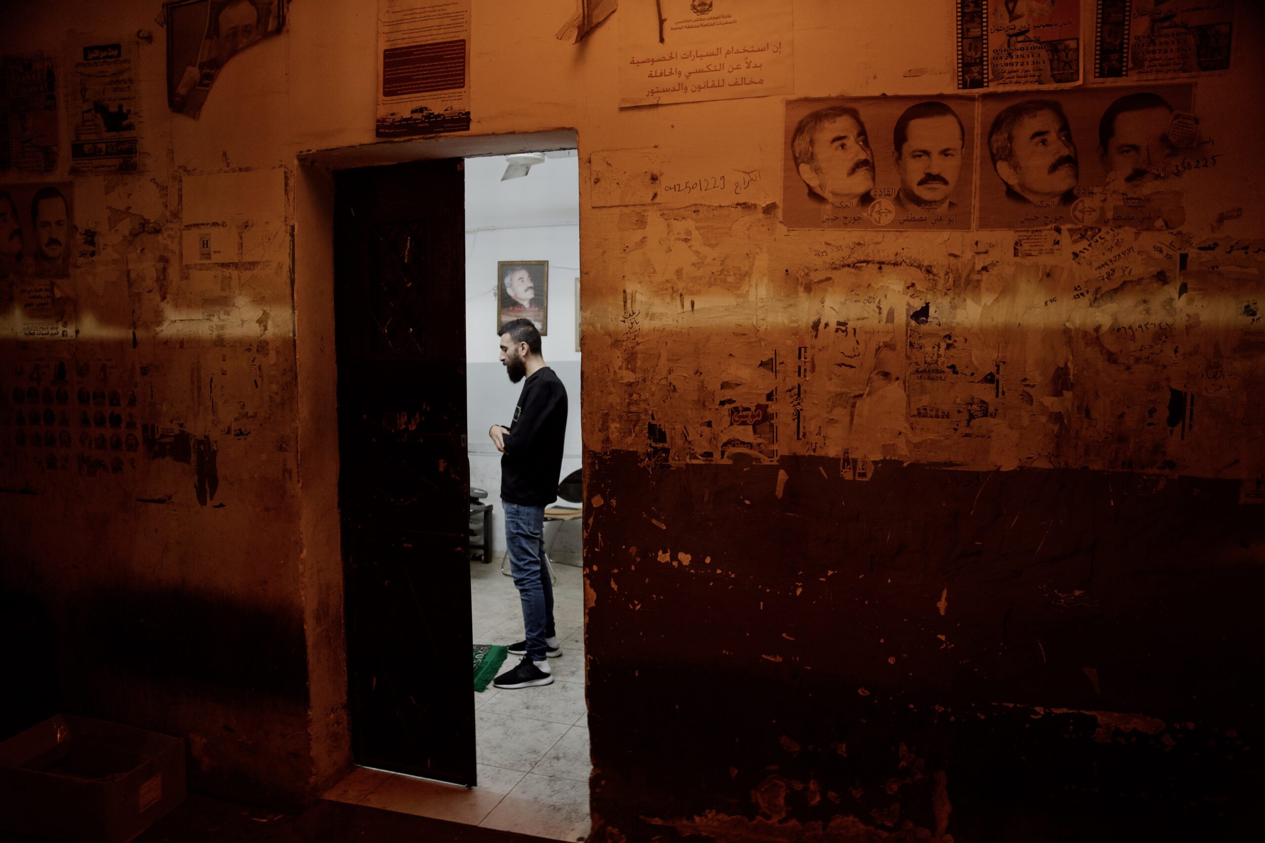 Prayer at the bus station, Jenin, Palestine, Fall 2023