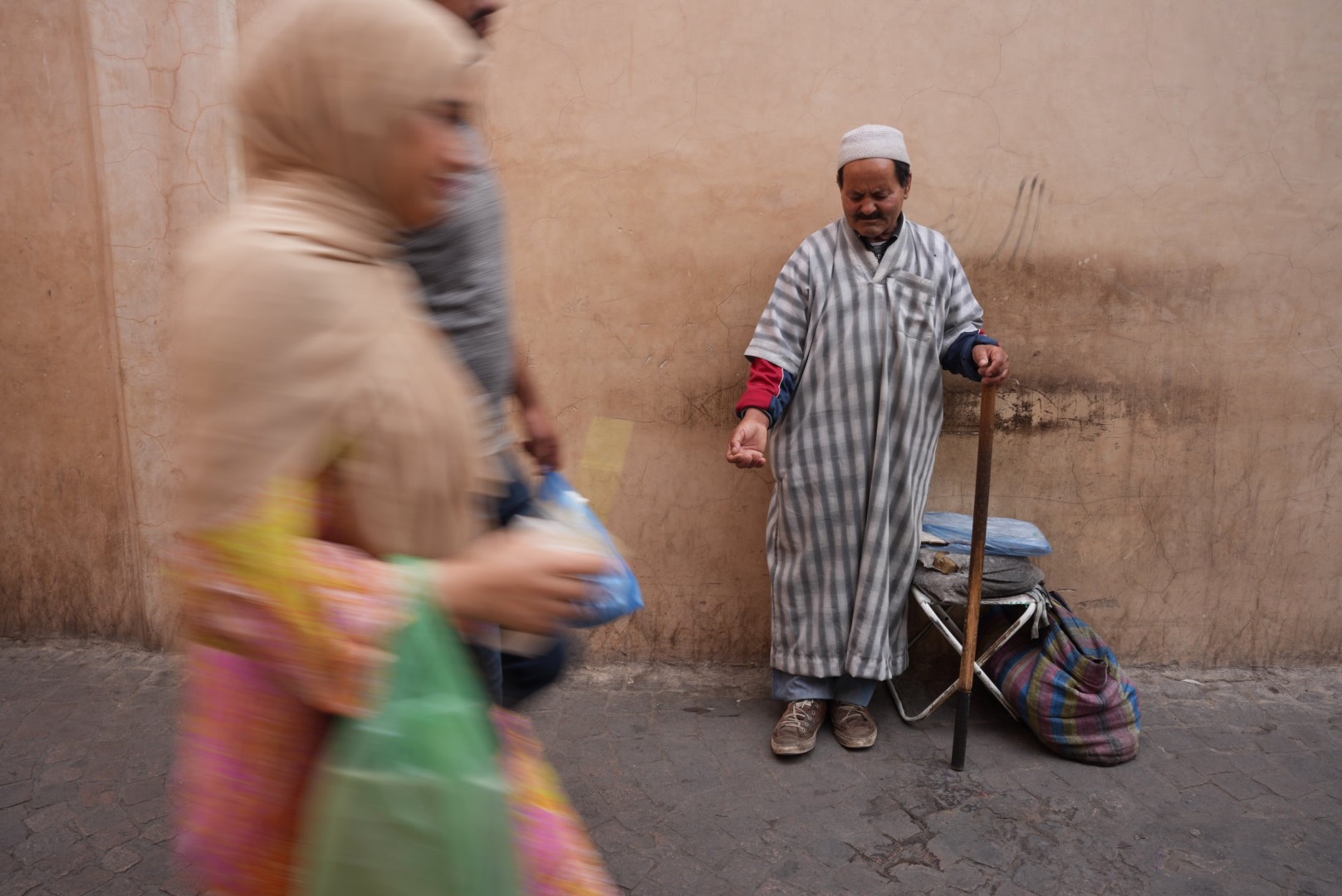 Begging in the Souk, Marrakesh, Morocco, Spring 2023